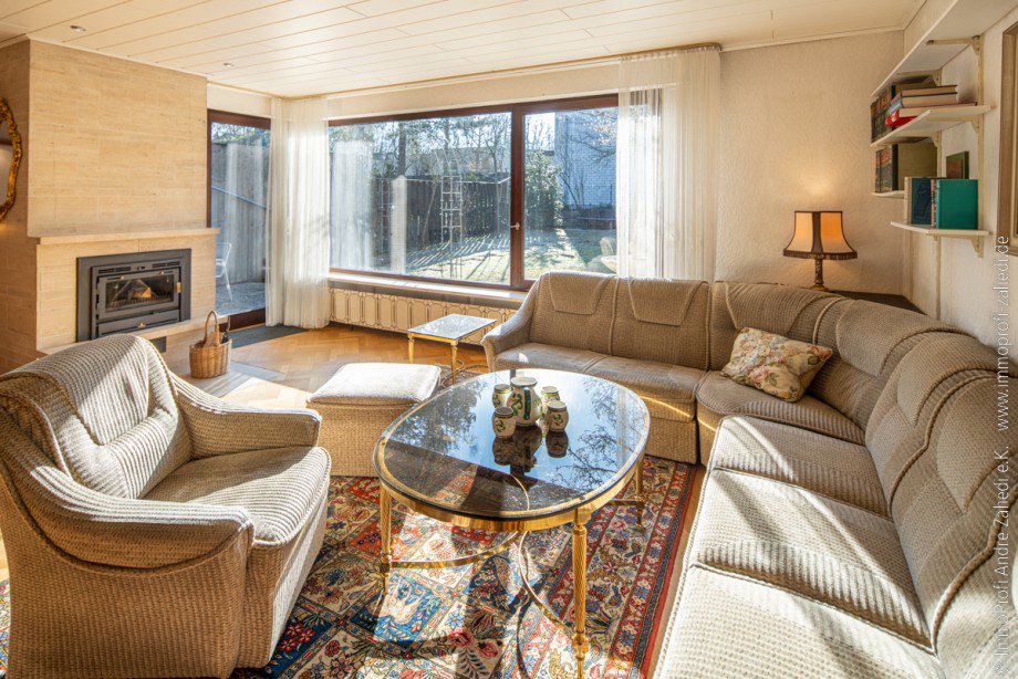 Wohnzimmer mit Kamin Einfamilienhaus Darmstadt / Kranichstein